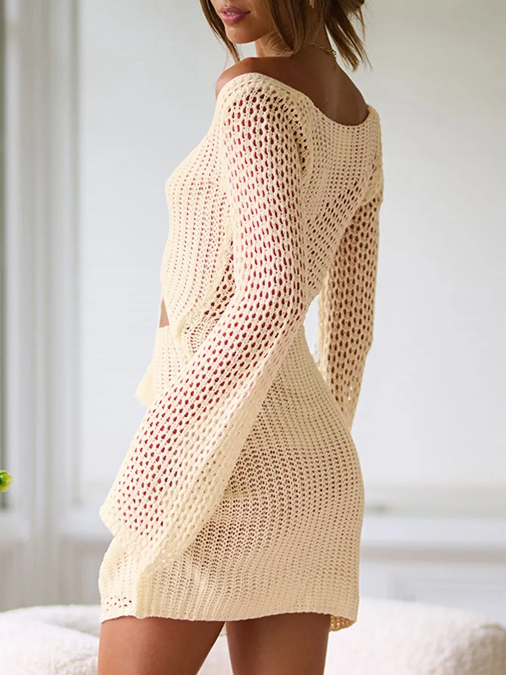 Knitted hollow out sexy exposed navel shoulder wrapped chest long sleeved slim fit beach skirt for women
